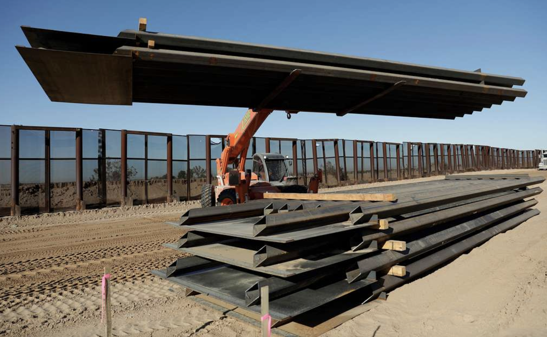 Steel contract signals physical wall construction